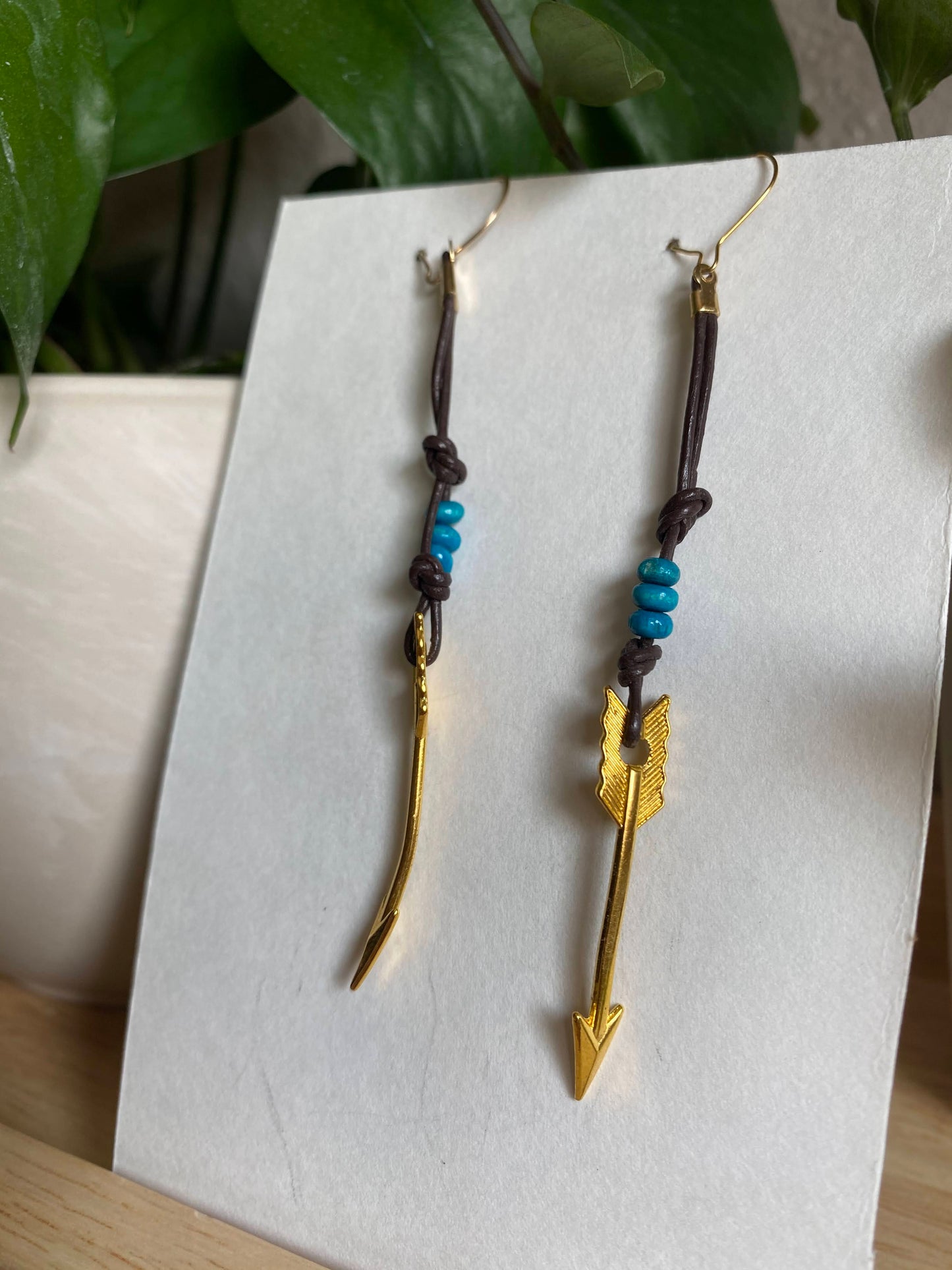 Gold Arrow Charm and Blue Wood Bead Dangle Earrings