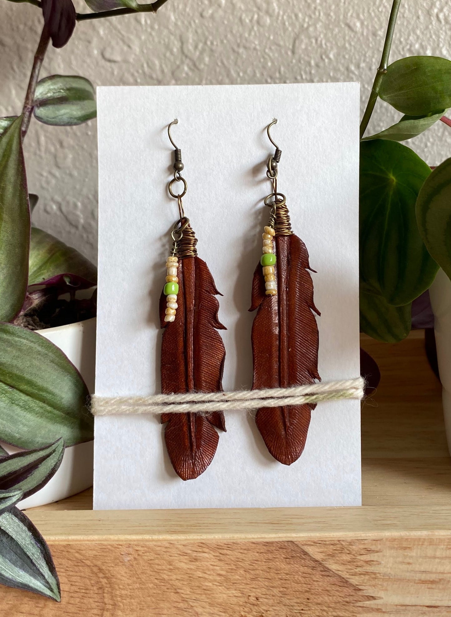 Leather Feather Earrings - Green Eyes