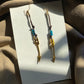 Gold Arrow Charm and Blue Wood Bead Dangle Earrings
