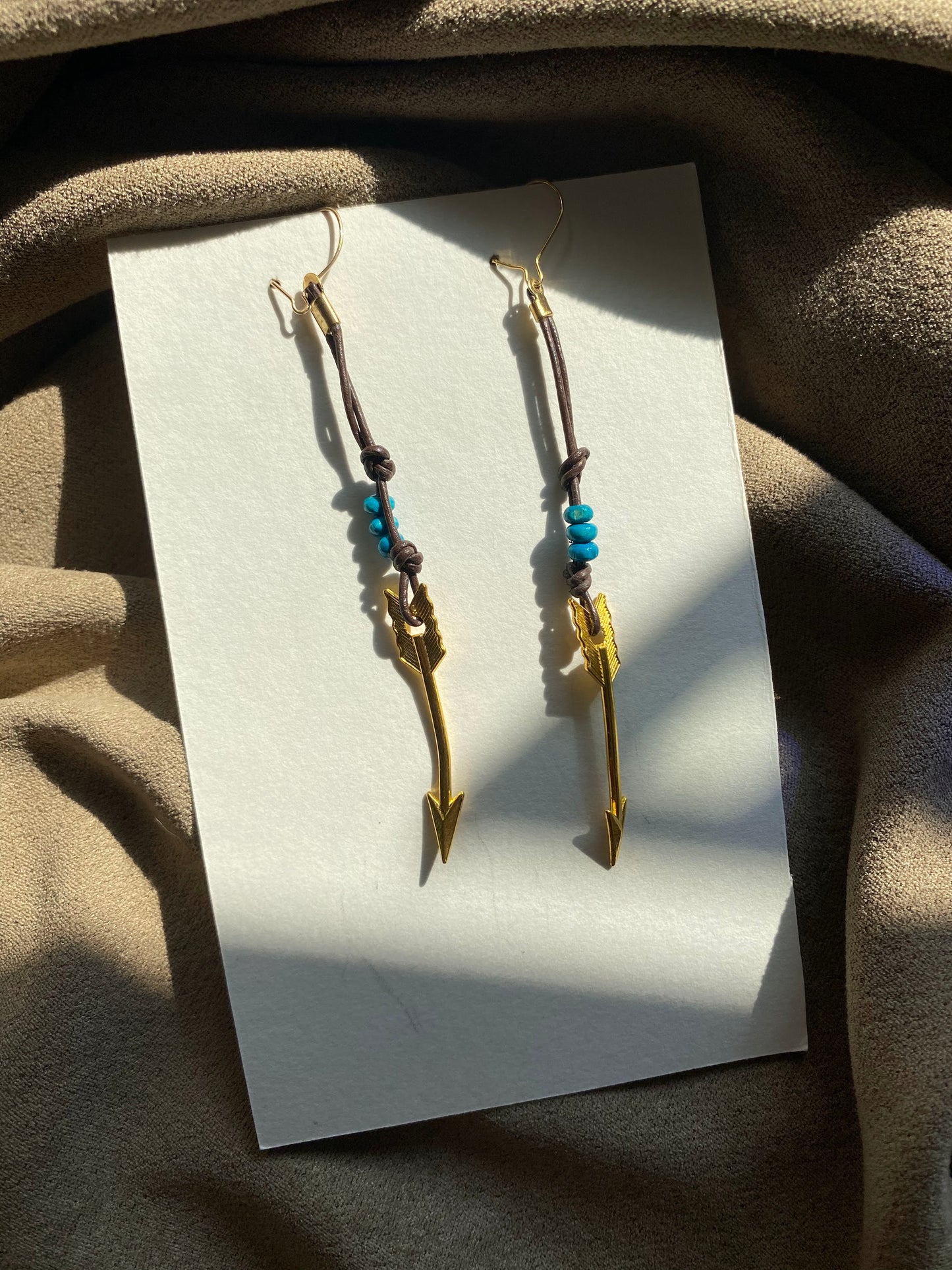 Gold Arrow Charm and Blue Wood Bead Dangle Earrings